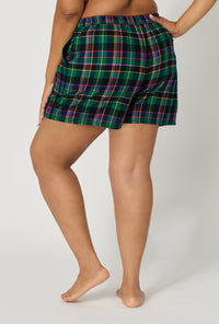 A lady wearing plus size Winter Plaid Woven Portuguese Flannel Boxer Short back view
