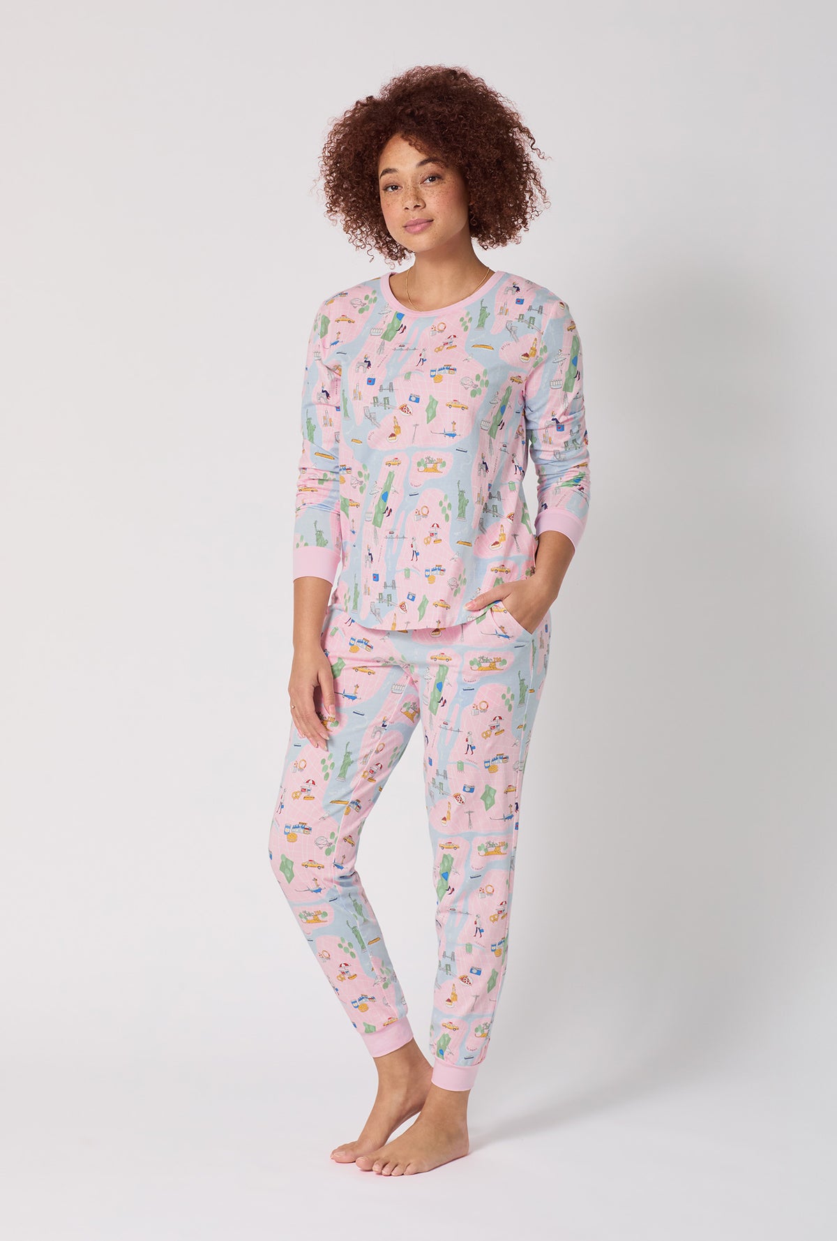 A lady wearing New York, New York Long Sleeve Pullover Crew And Jogger Stretch Jersey Pj Set