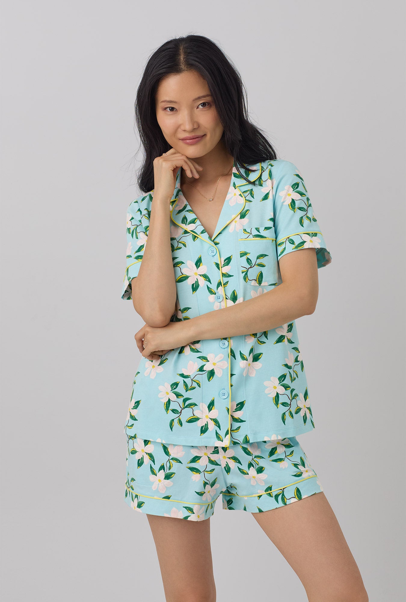 A lady wearing short sleeve classic shorty stretch jersey pj set with belle blossoms print