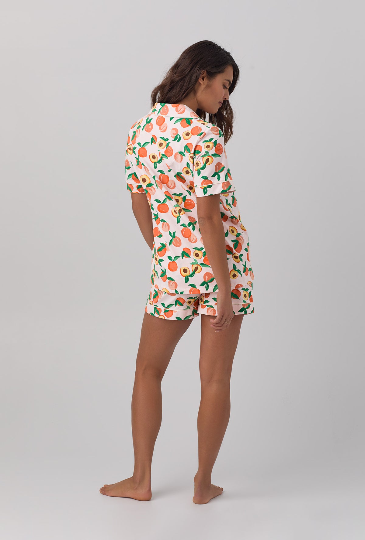A lady wearing Short Sleeve Classic Shorty Stretch Jersey PJ Set with Peachy Keen print