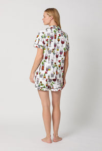 A lady wearing  White Short Sleeve Classic Shorty Stretch Jersey Pj Set back view