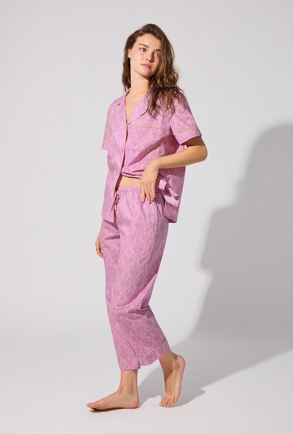 A lady wearing Colette Short Sleeve Classic Woven Cotton Poplin Cropped PJ Set