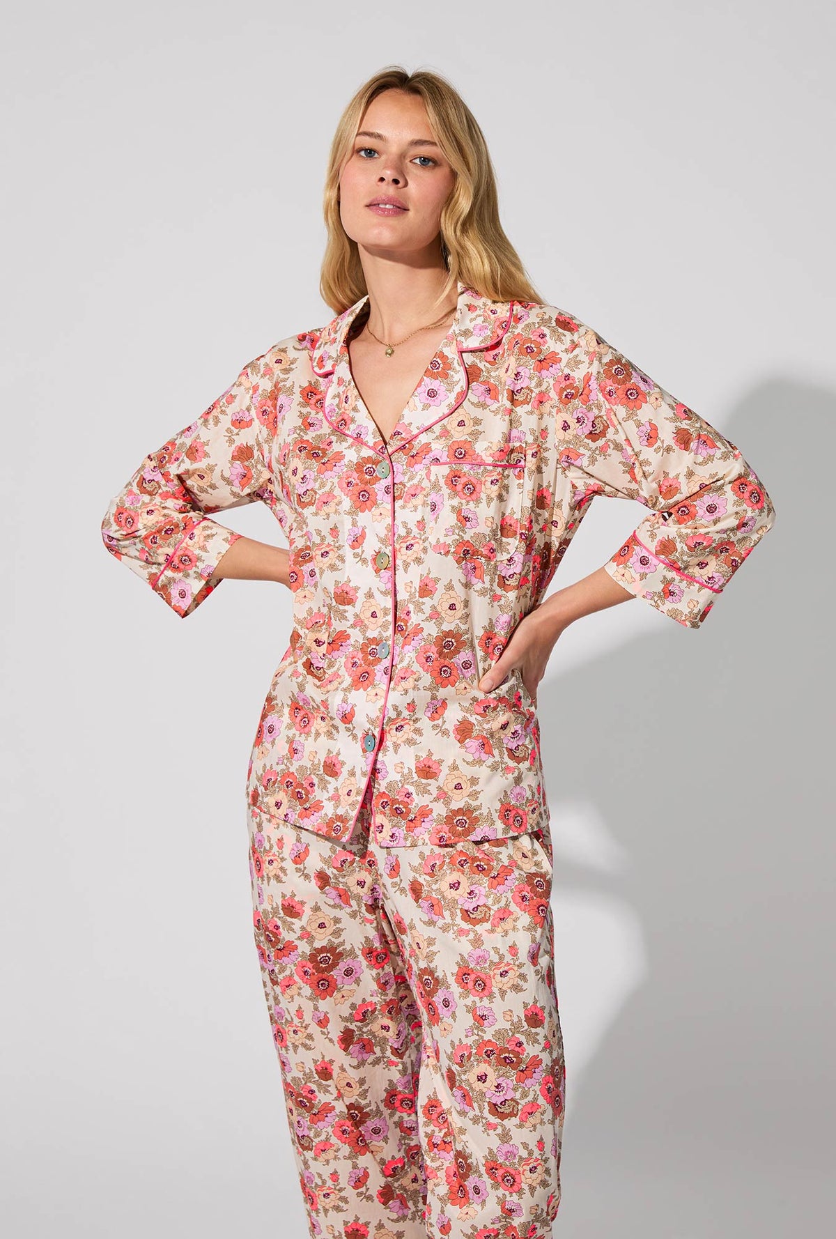 A lady wearing Madeleine 3/4 Sleeve Classic Woven Tana Lawn® Cropped PJ set Made With Liberty Fabric