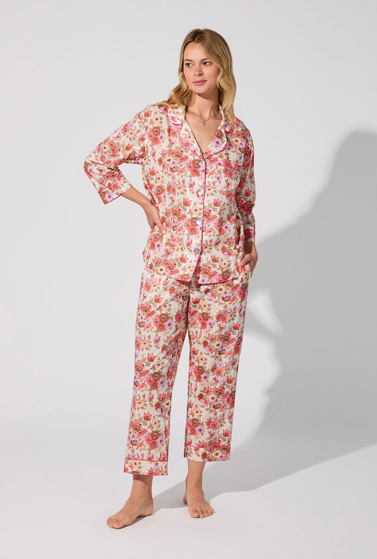 A lady wearing Madeleine 3/4 Sleeve Classic Woven Tana Lawn® Cropped PJ set Made With Liberty Fabric