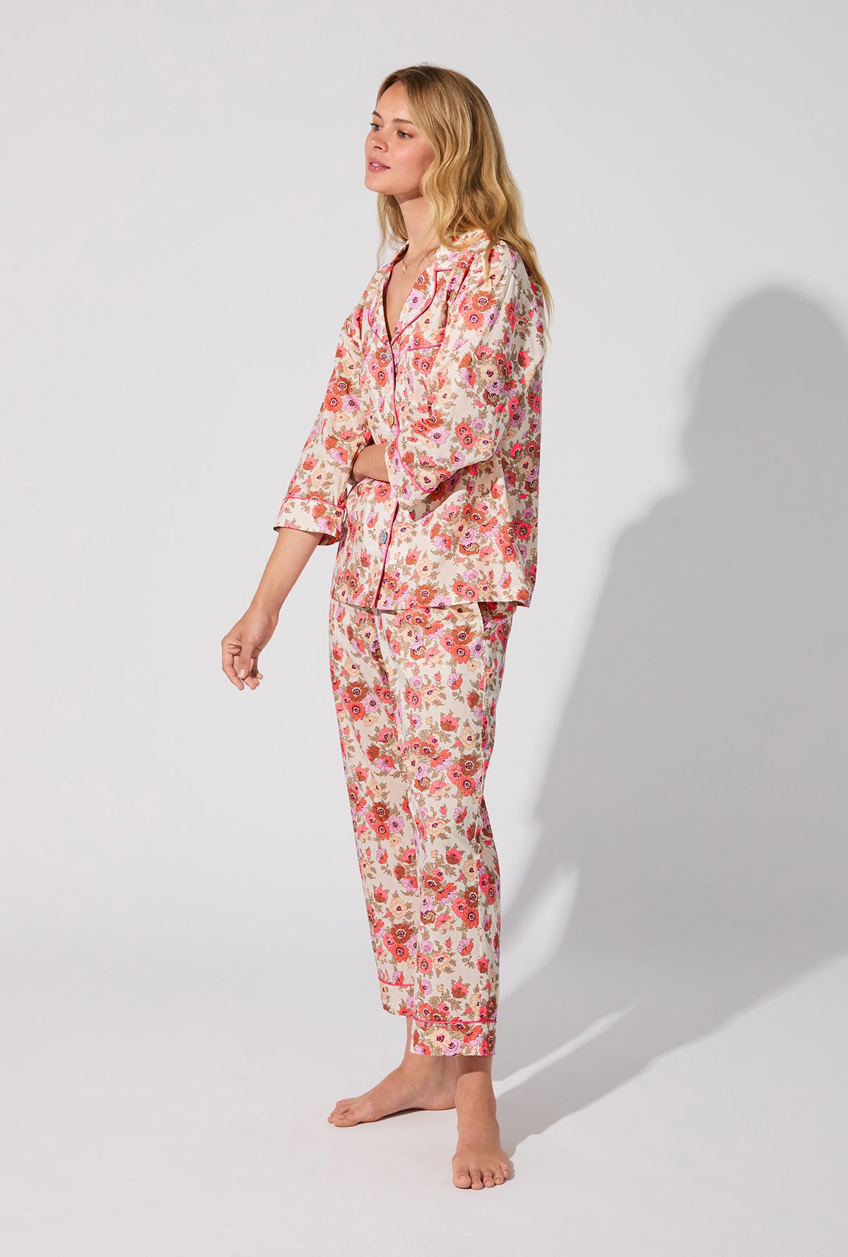 A lady wearing Madeleine 3/4 Sleeve Classic Woven Tana Lawn® Cropped PJ set Made With Liberty Fabric