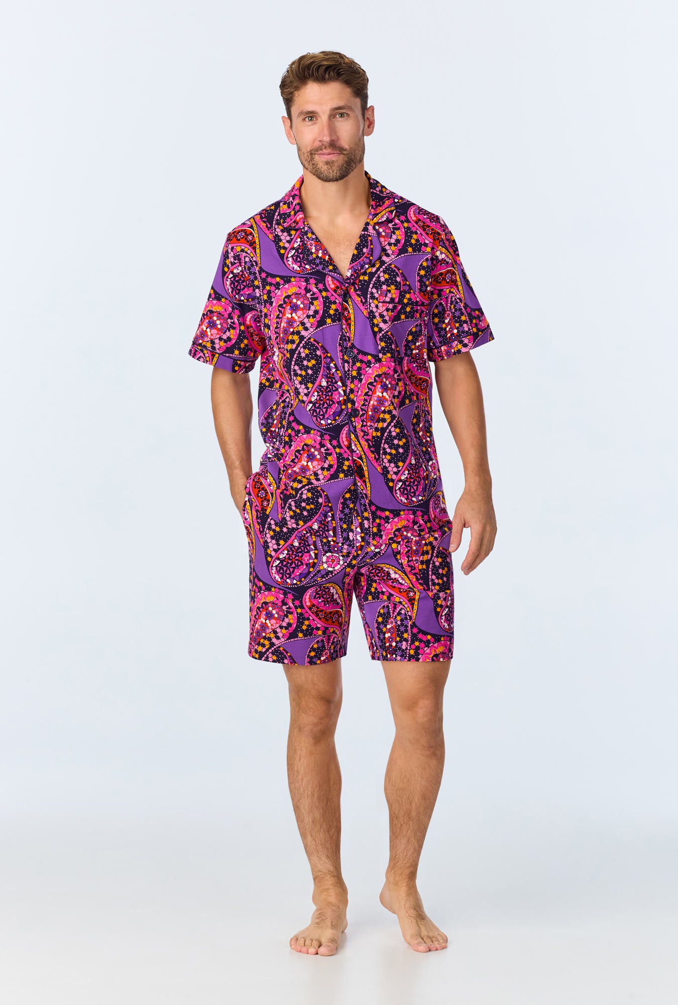 A man wearing a  Tangled Paisley Men's Short Sleeve Notch Stretch Jersey Short PJ Set