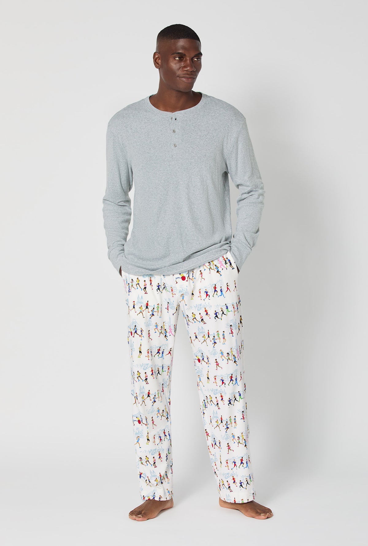 A man wearing Run NYC Run Men's Long Sleeve Henley Stretch Jersey Pj Set