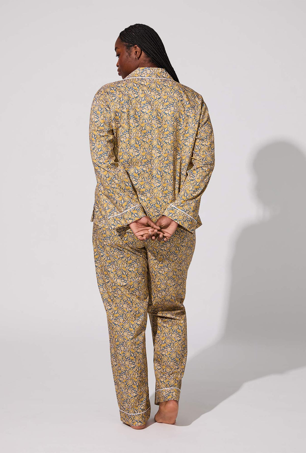 A lady wearing Theodore Manor Long Sleeve Classic Woven Tana Lawn® PJ Set Made With Liberty Fabric