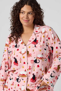 A Lady Wearing Plus Size Bazaar Cats Long Sleeve Classic Stretch Jersey Pj Set in a front close up shot