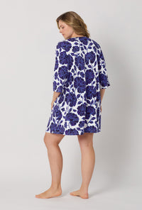 A lady wearing plus size Blue and  White Stretch Jersey Sleep Dress back view