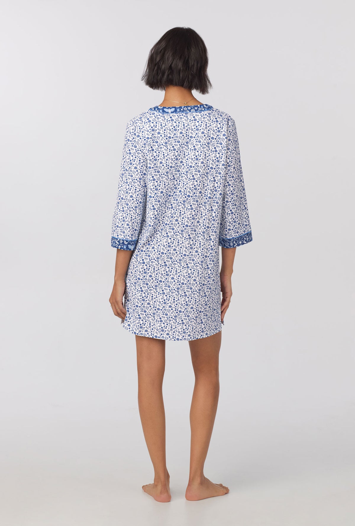 A lady wearing quarter Sleeve Stretch Jersey Sleepshirt with Woodland Trails print 