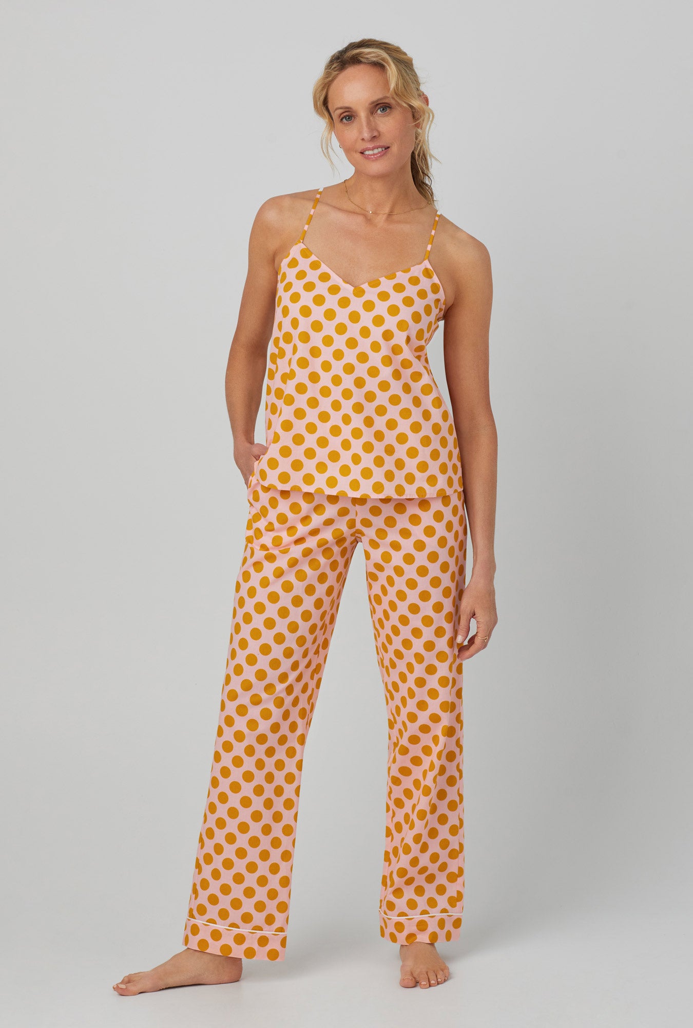 A lady wearing cami tank woven cotton poplin long pj set with call button