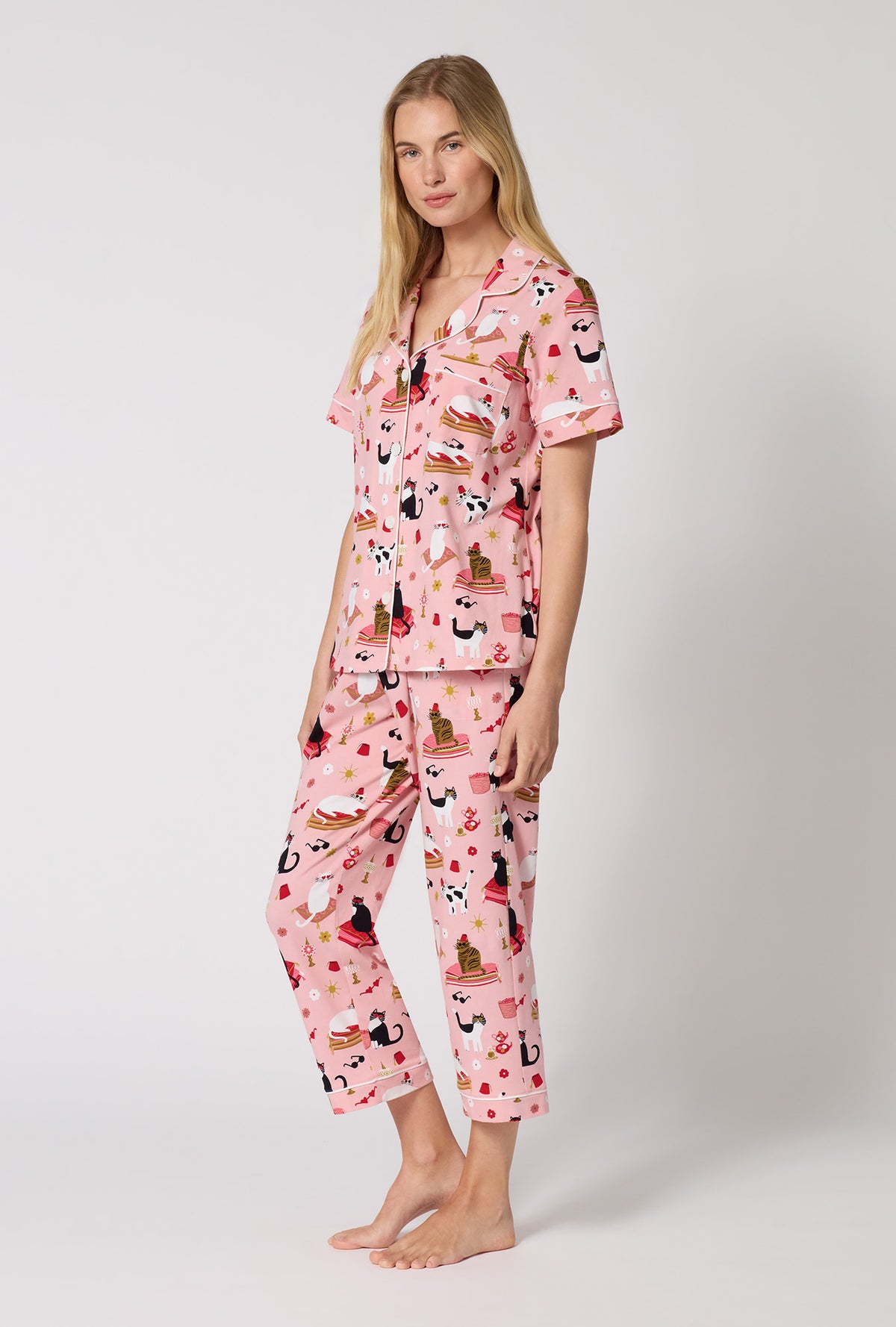 A Lady Wearing Bazaar Cats Short Sleeve Classic Stretch Jersey Cropped Pj Set in a side angled pose