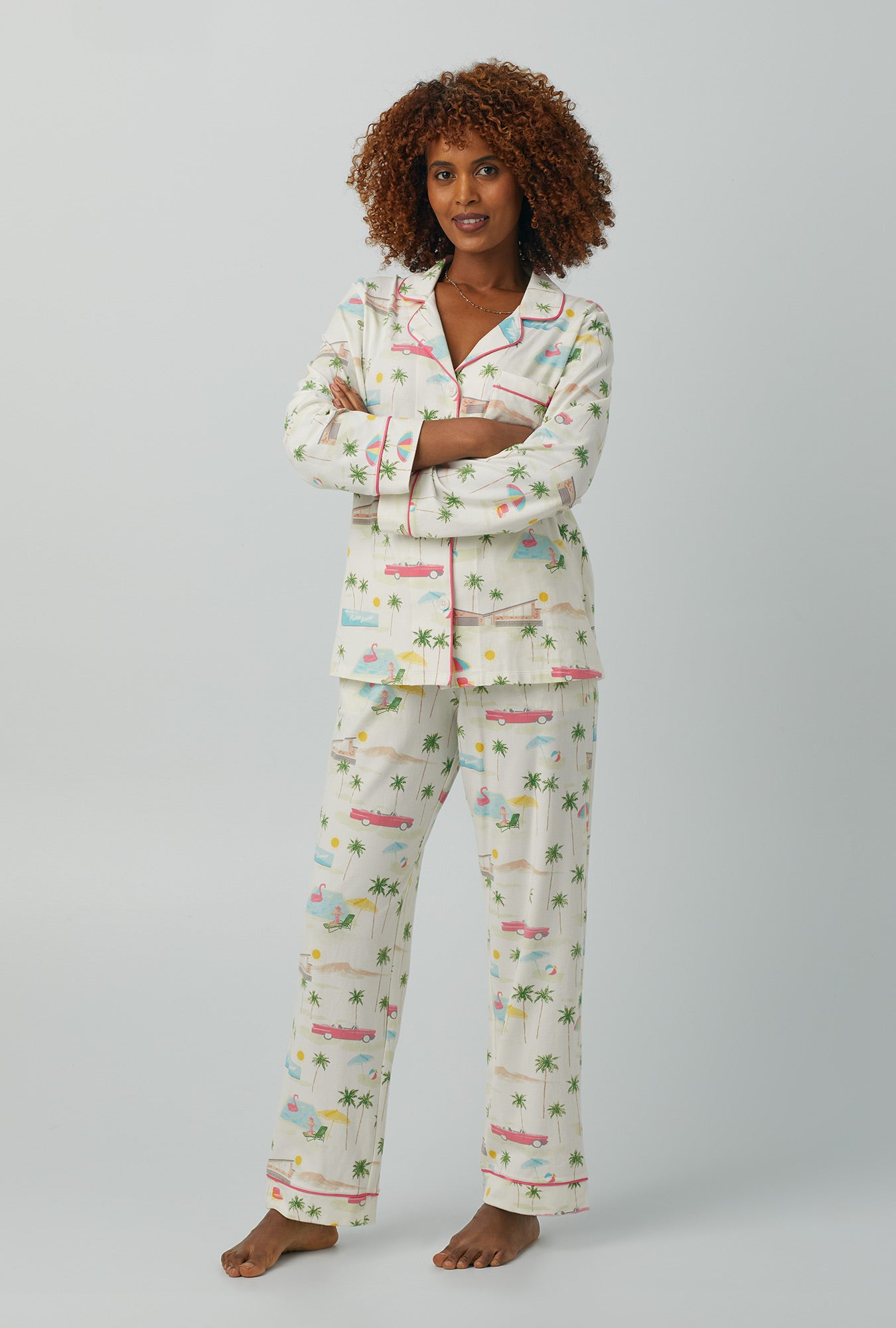 A lady wearing white Long Sleeve Classic Stretch Jersey PJ Set with Welcome To Palm Springs print