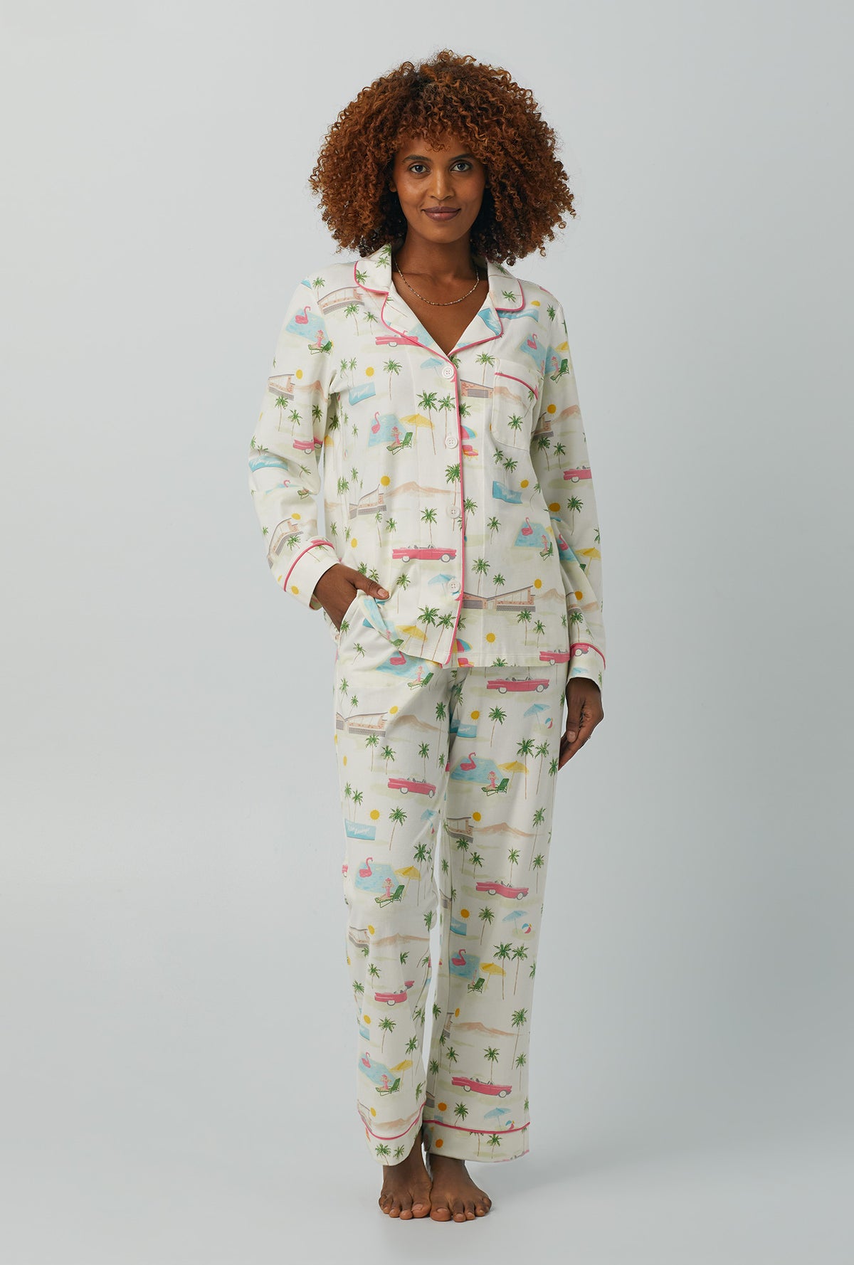 A lady wearing white Long Sleeve Classic Stretch Jersey PJ Set with Welcome To Palm Springs print