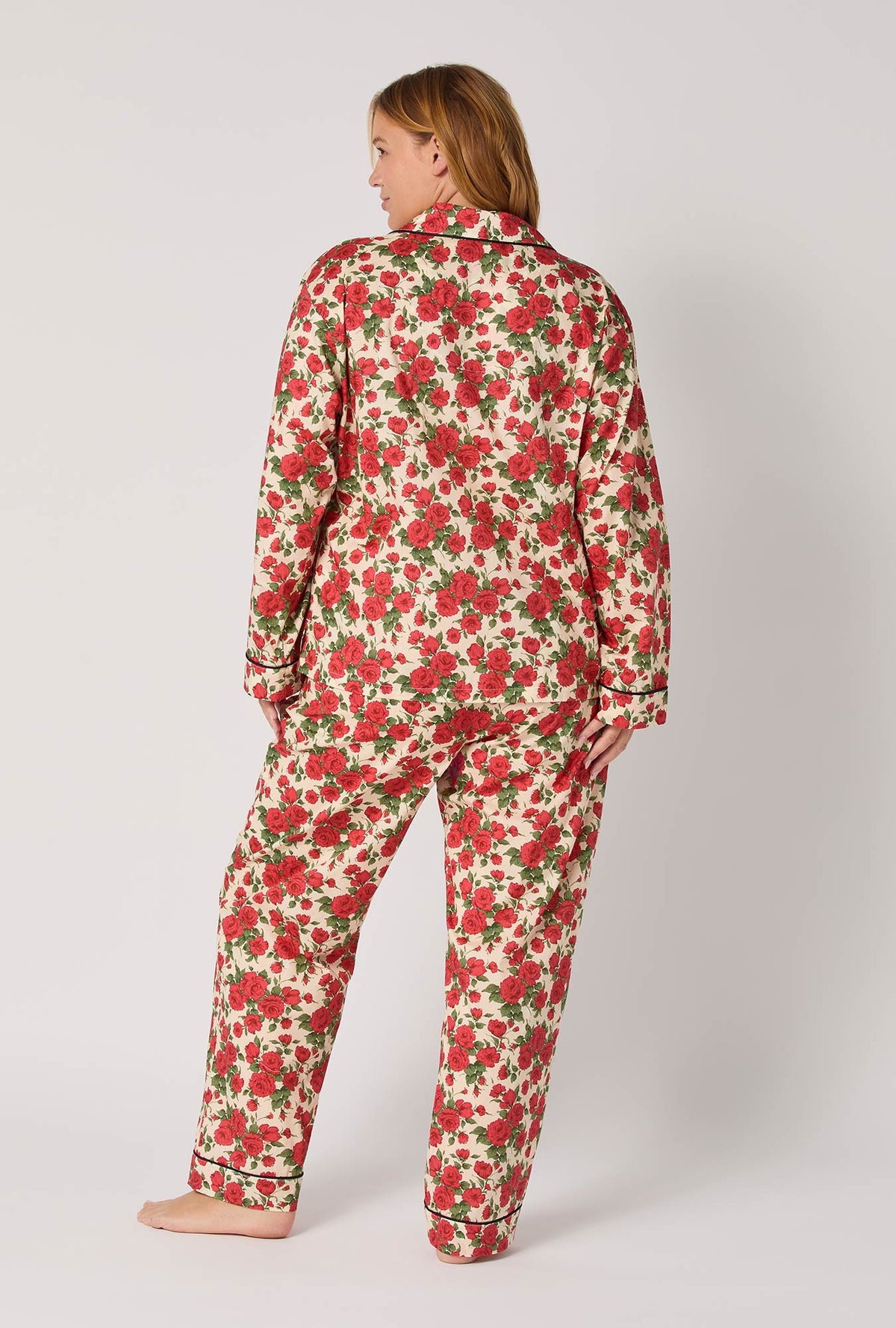 A lady wearing Carline Rose Long Sleeve Classic Woven Tana Lawn® Plus Pj Set Made With Liberty Fabric