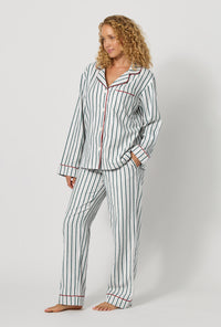 A lady wearing Peppermint Stripe Long Sleeve Classic Woven Portuguese Flannel Pj Set looking side