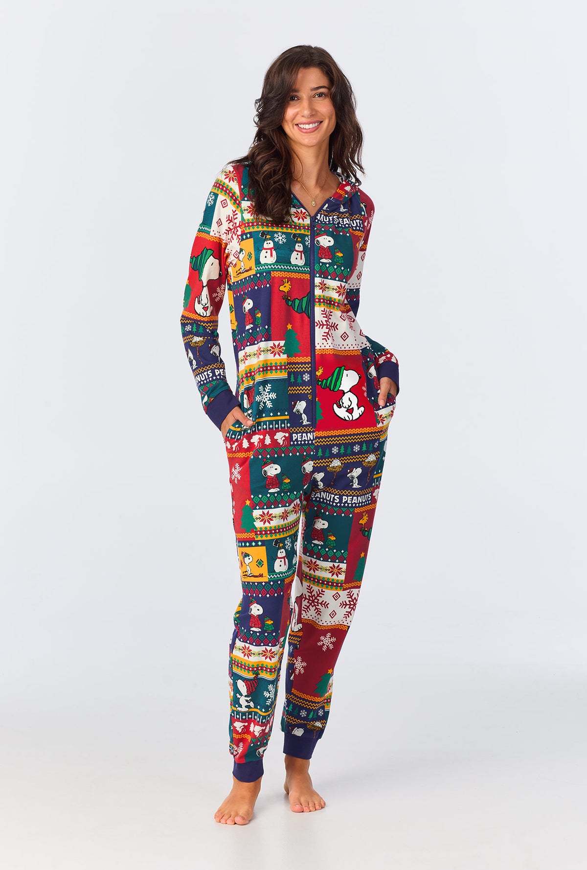 A lady wearing fairisle snoopy long sleeve onesie