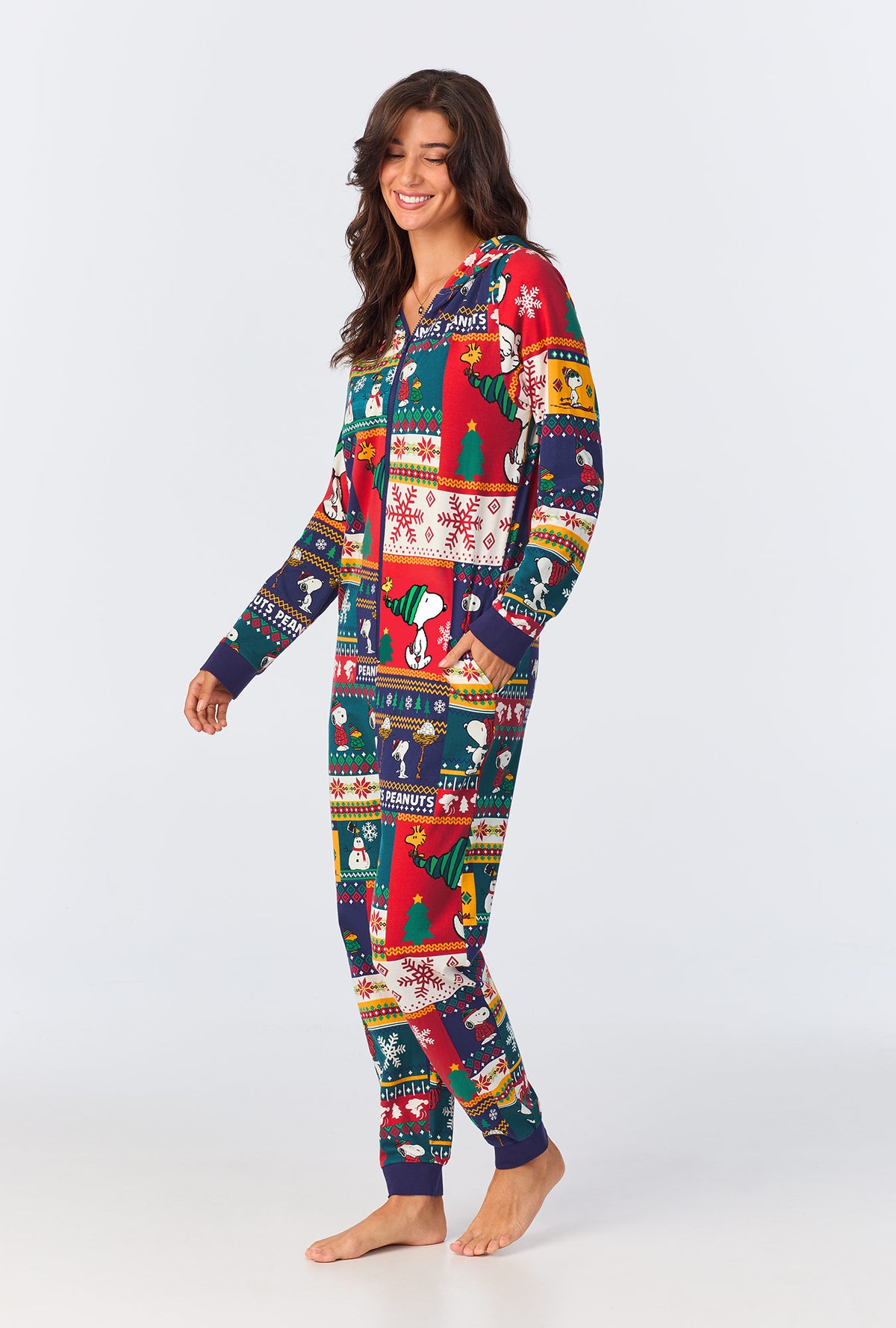 A lady wearing fairisle snoopy long sleeve onesie