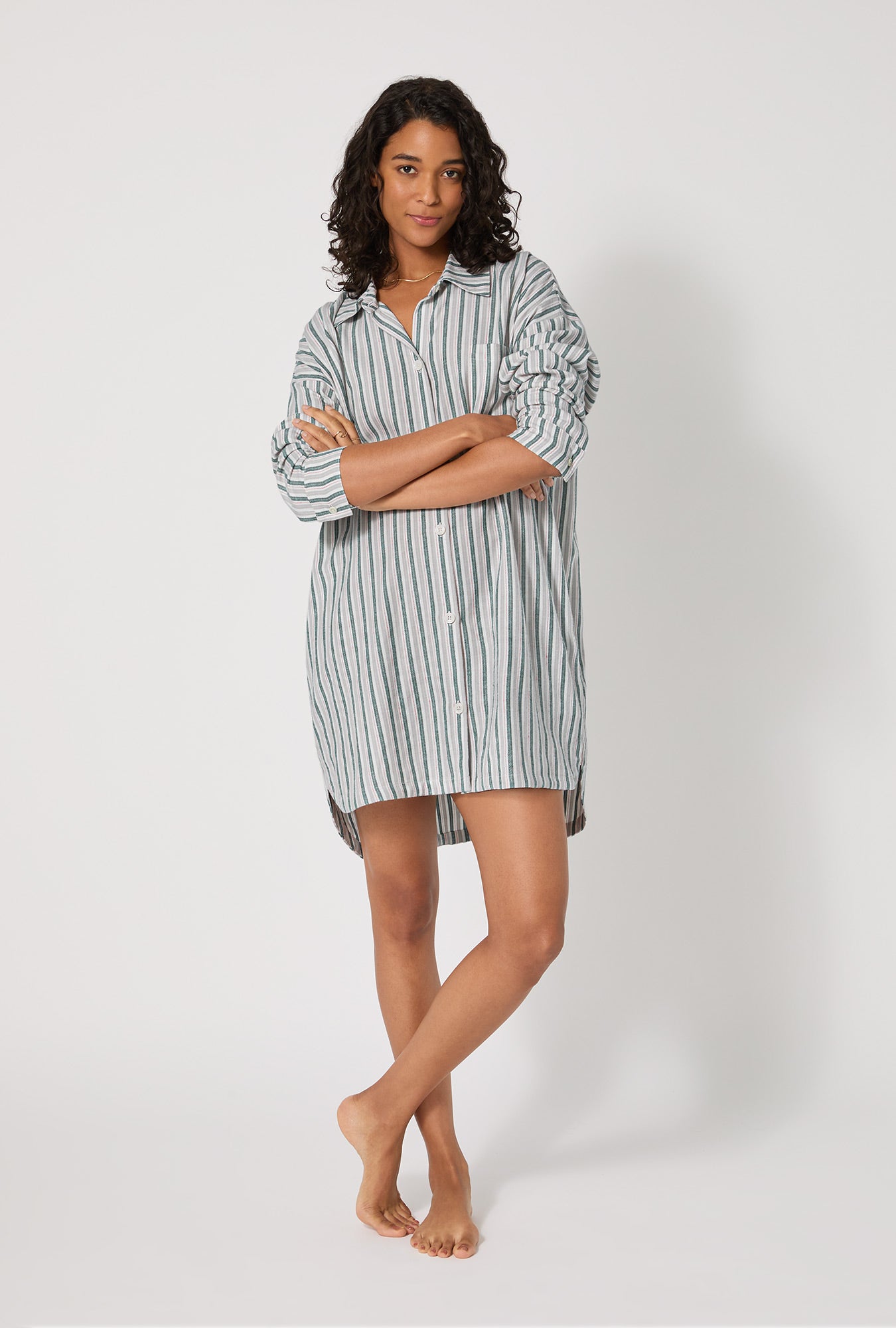 A lady wearing Peppermint Stripe High Low Woven Portuguese Flannel Boyfriend Shirt