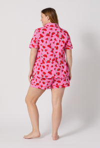 A lady wearing plus size Watermelon Crush Short Sleeve Classic Shorty Stretch Jersey Pj Set back view