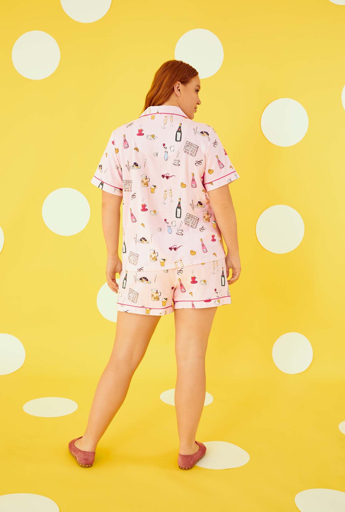 A lady wearing Short Sleeve Classic Shorty Stretch Jersey plus size PJ Set with Let&#39;s Do Brunch print