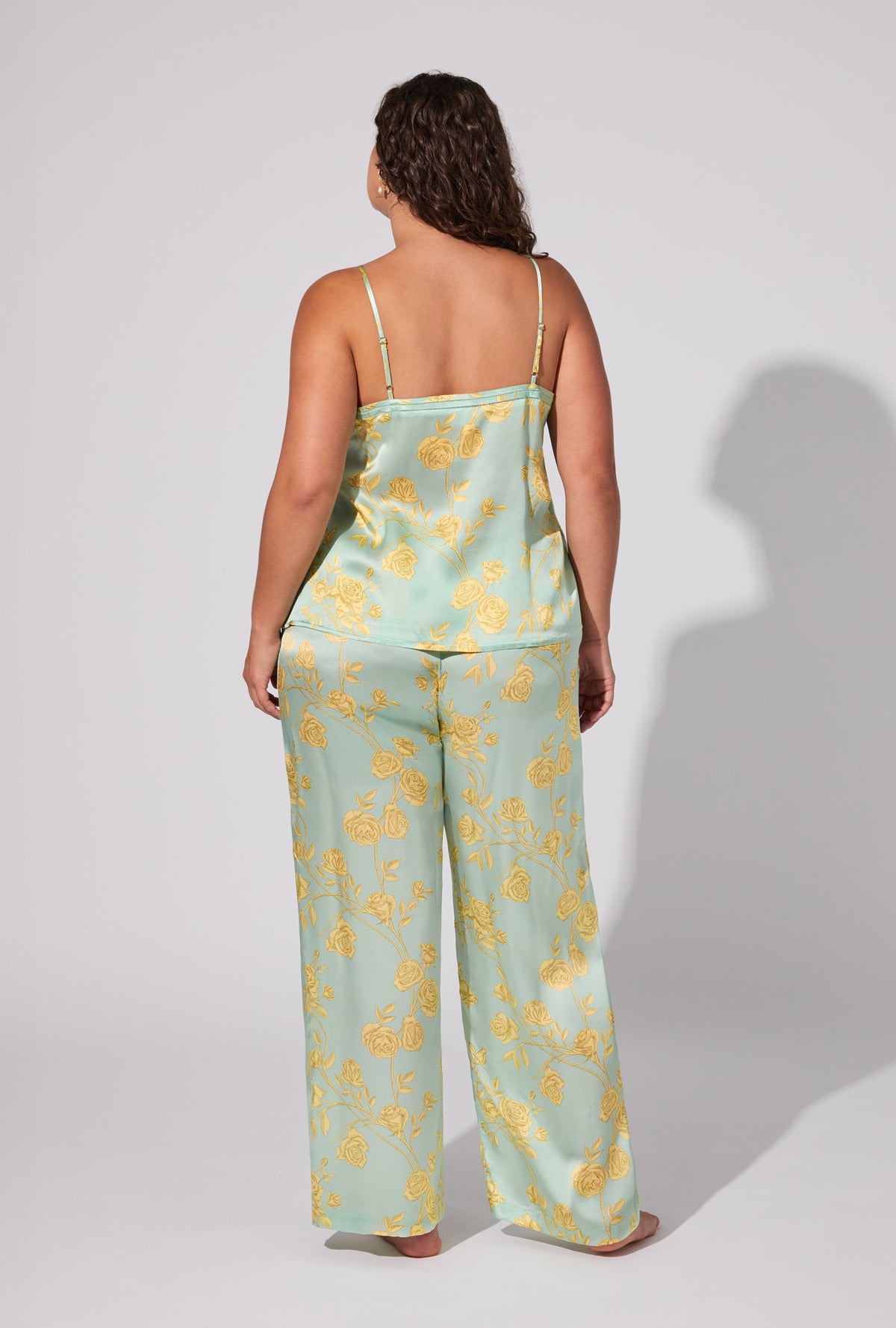A lady wearing Royal Roses Cami Top Woven Washable Silk Satin Long PJ Set
