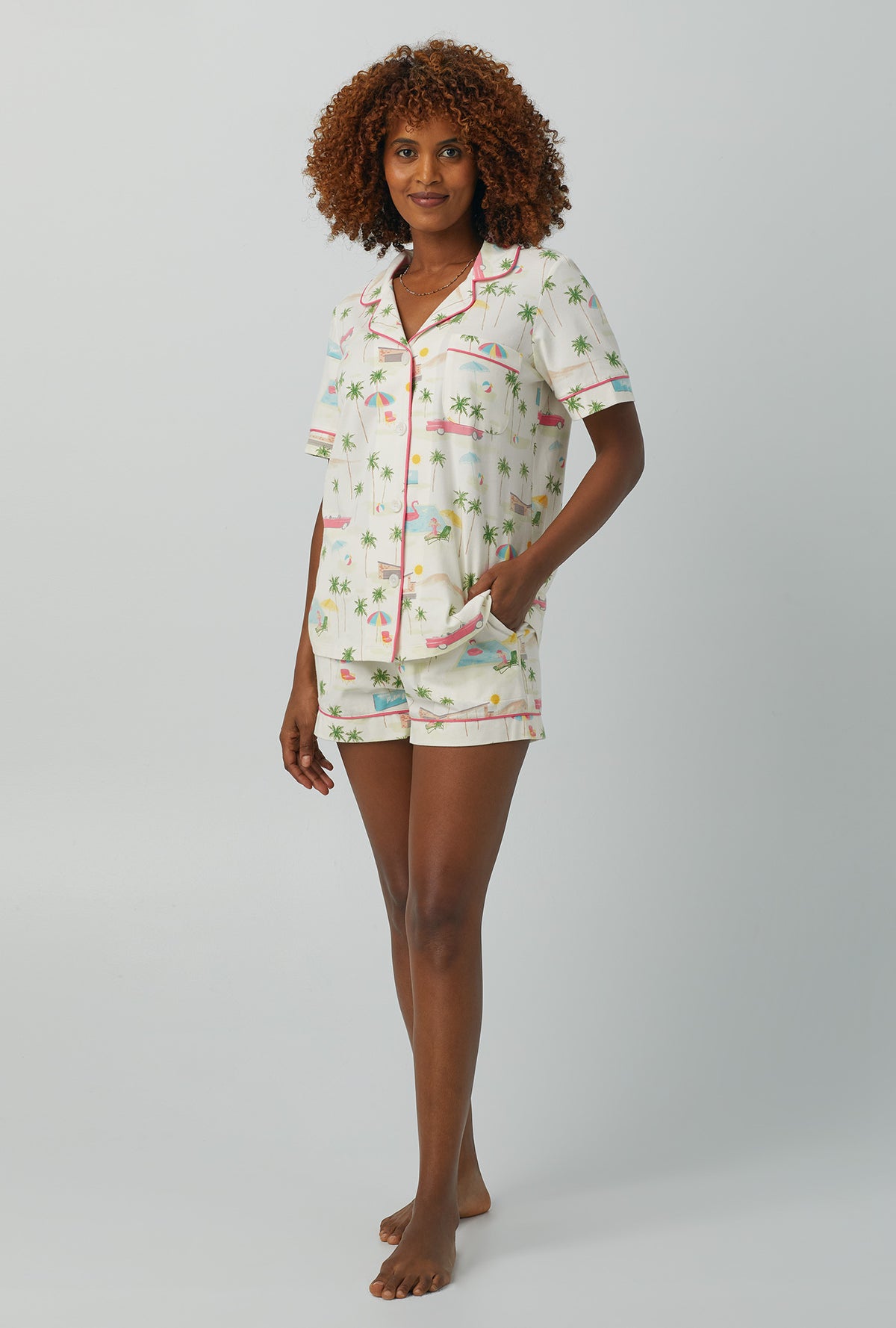 A lady wearing white Short Sleeve Classic Shorty Stretch Jersey PJ Set with Welcome To Palm Springs print