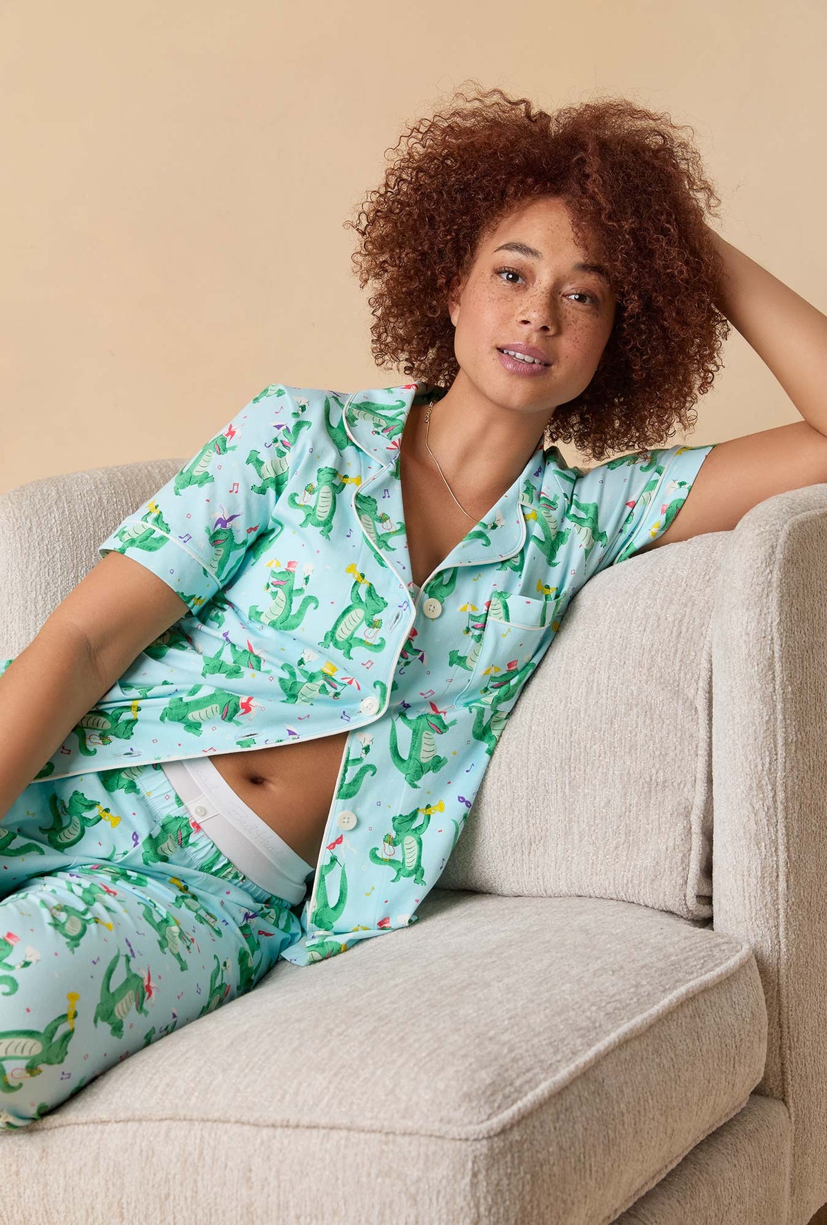 A lady wearing Jazzy Gators Short Sleeve Classic Stretch Jersey Cropped Pj Set