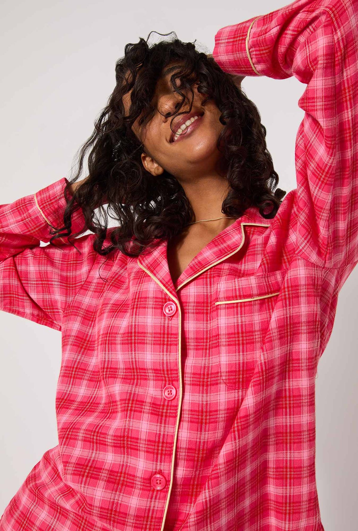 A lady wearing Wonderland Plaid Long Sleeve Classic Woven Portuguese Flannel PJ Set