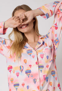 A Lady Wearing Serene Sunrise Long Sleeve Classic Stretch Jersey Pj Set in a front close up view pose