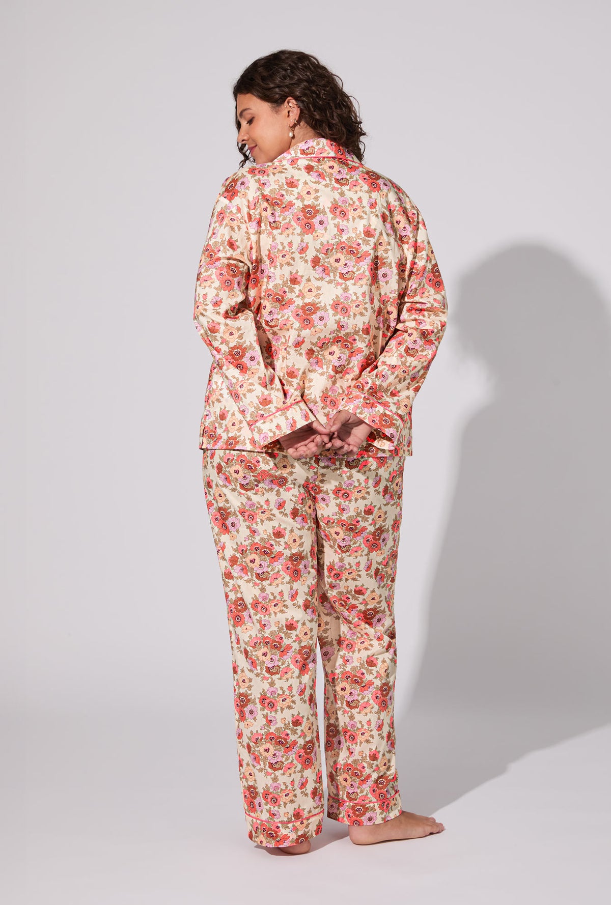 A lady wearing Madeleine Long Sleeve Classic Woven Tana Lawn® PJ Set Made With Liberty Fabric