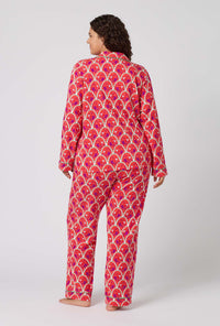 A Lady Wearing Plus Size Monkeying Around Long Sleeve Classic Stretch Jersey Pj Set in a back view pose