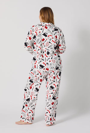 A lady wearing plus size Devil Wears Prada Long Sleeve Classic Stretch Jersey Pj Set back view