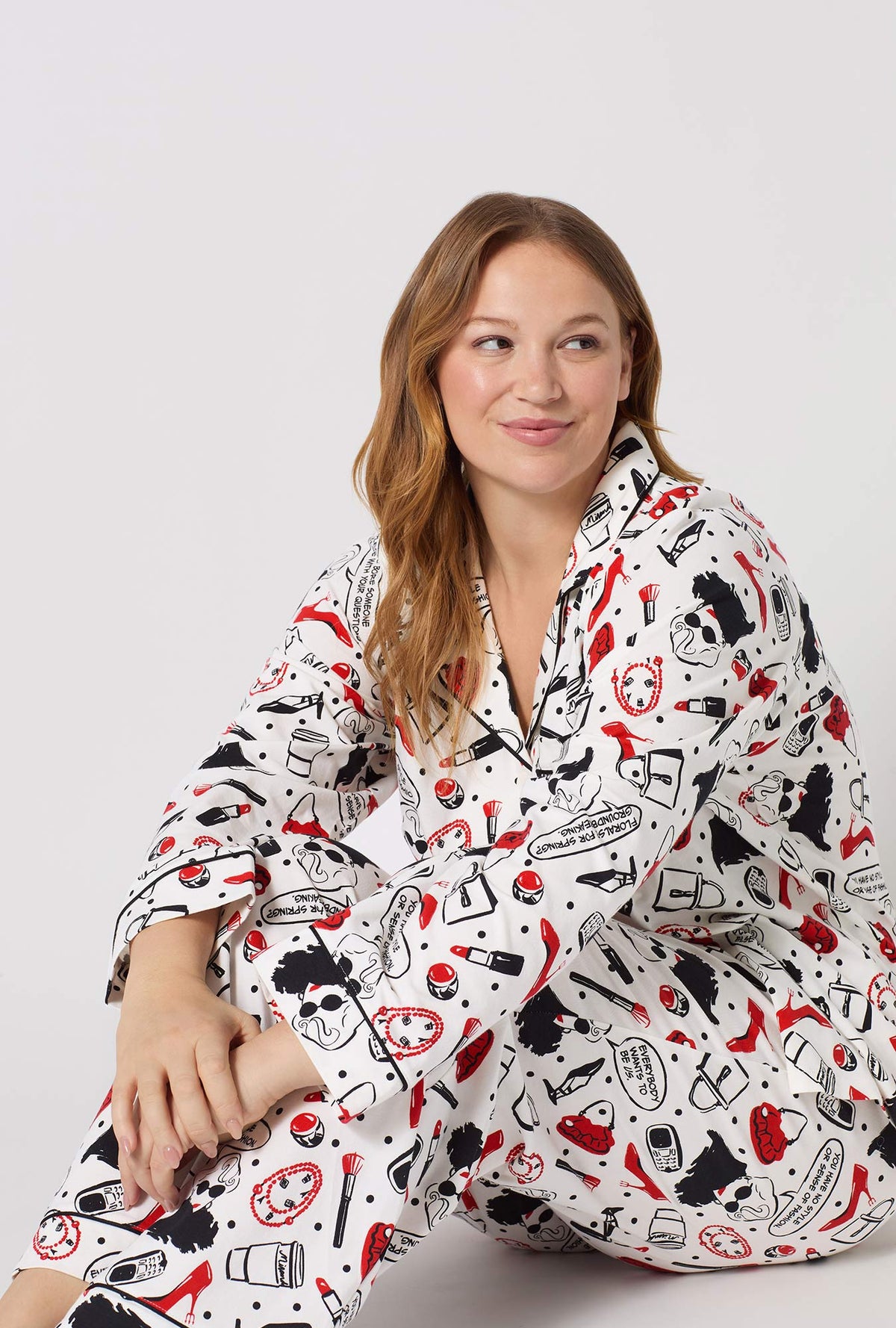 A lady wearing plus size Devil Wears Prada Long Sleeve Classic Stretch Jersey Pj Set closer look sitting