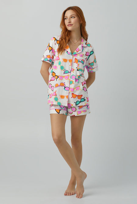 A lady wearing multi color  Short Sleeve Classic Shorty Stretch Jersey PJ Set with Sunny Lens print