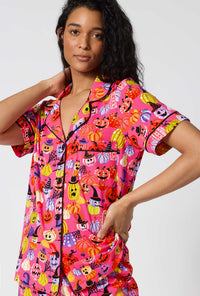 A Lady Wearing Pumpkin Patch Party Short Sleeve Classic Shorty Stretch Jersey Pj Set in a front close up view pose