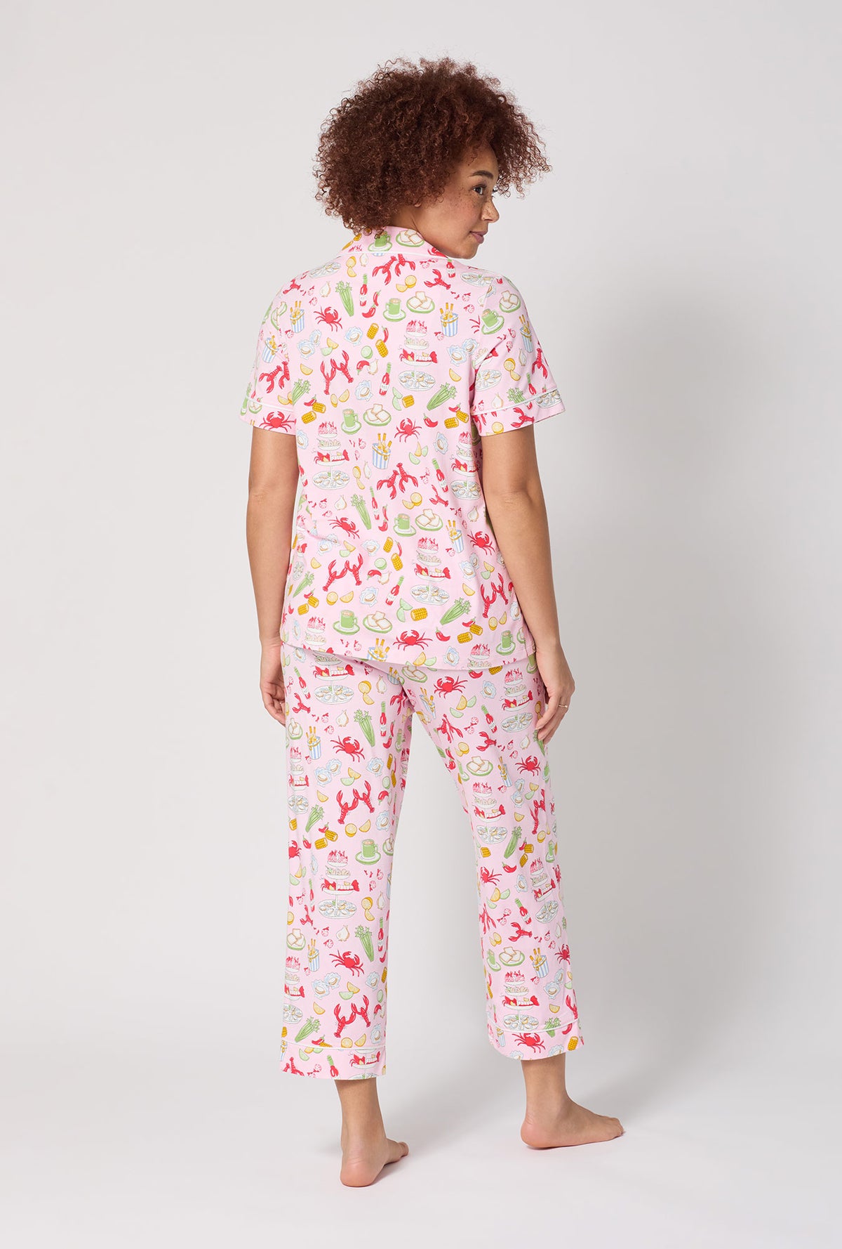 A lady wearing French Quarter Short Sleeve Classic Stretch Jersey Cropped Pj Set