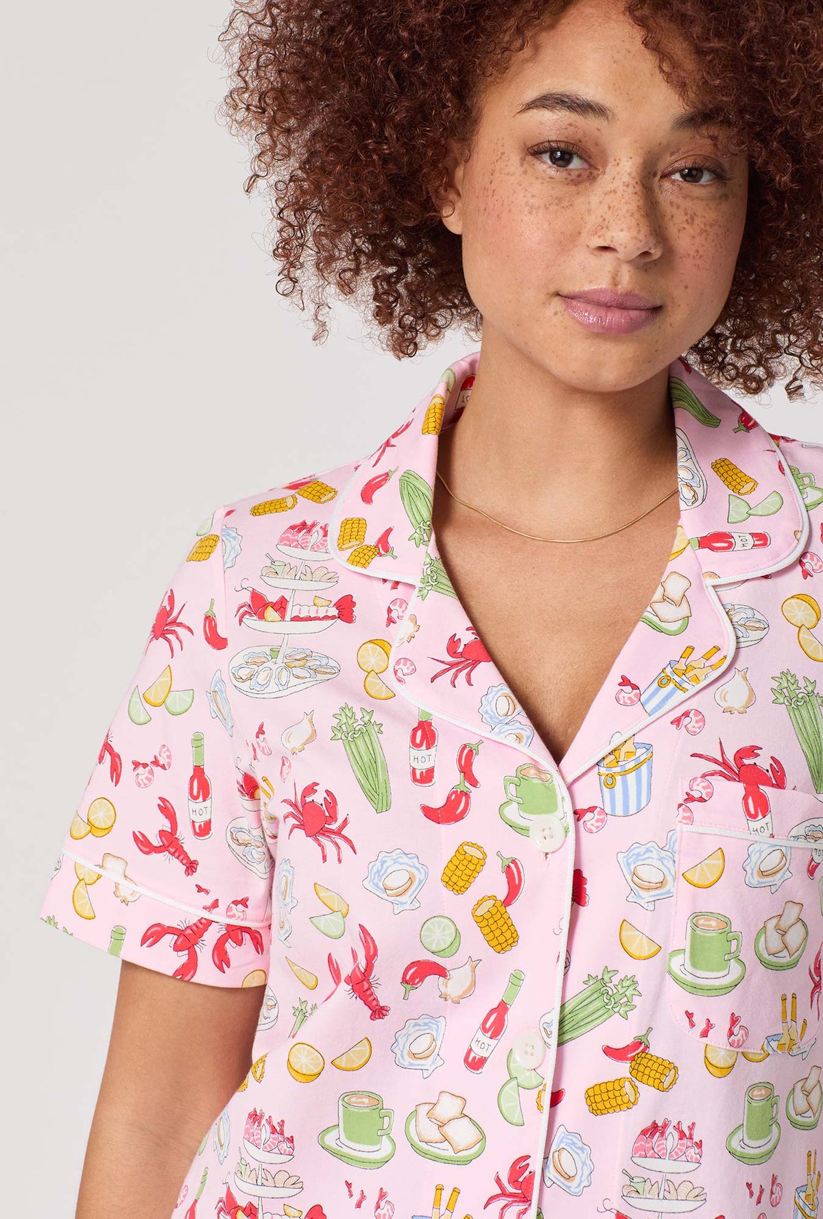 A lady wearing French Quarter Short Sleeve Classic Stretch Jersey Cropped Pj Set