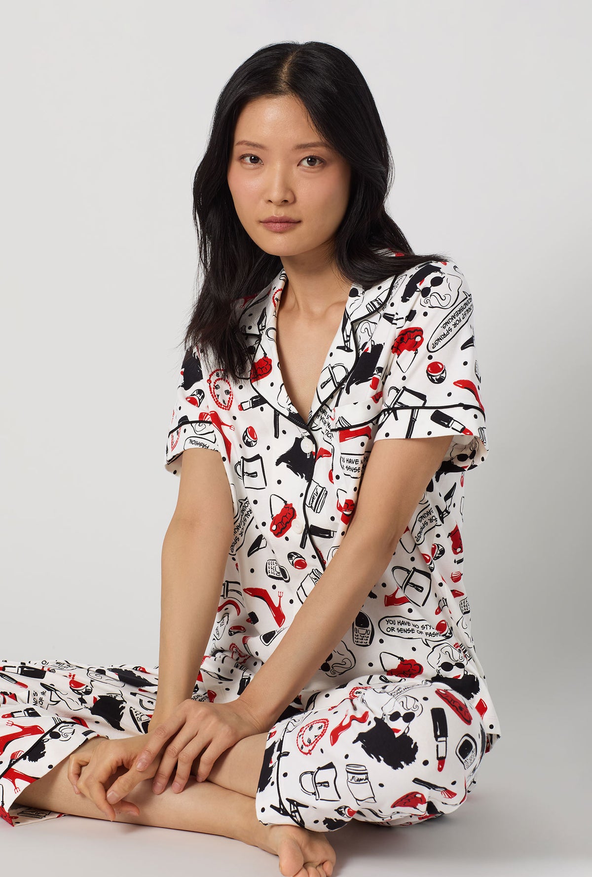 A lady wearing Devil Wears Prada Short Sleeve Classic Stretch Jersey Cropped Pj Set closer look sitting