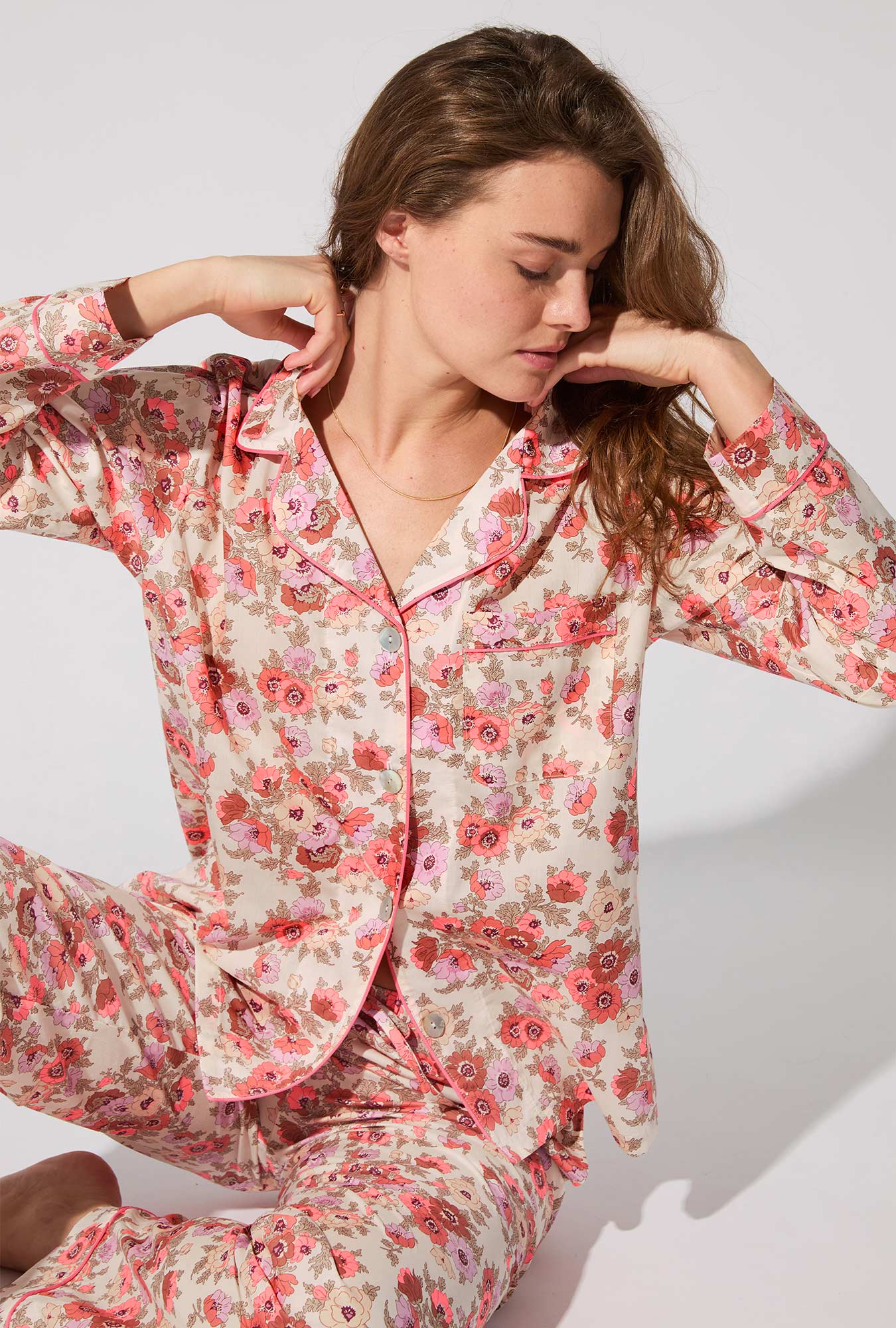 A lady wearing Madeleine Long Sleeve Classic Woven Tana Lawn® PJ Set Made With Liberty Fabric