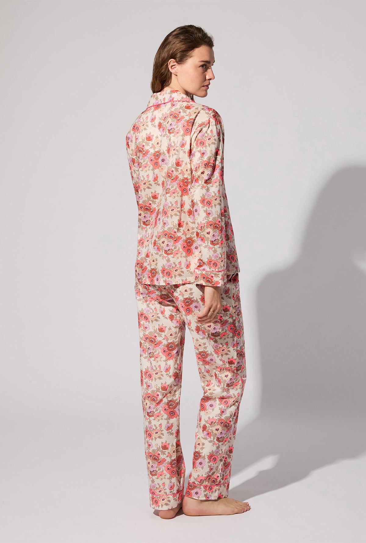 A lady wearing Madeleine Long Sleeve Classic Woven Tana Lawn® PJ Set Made With Liberty Fabric