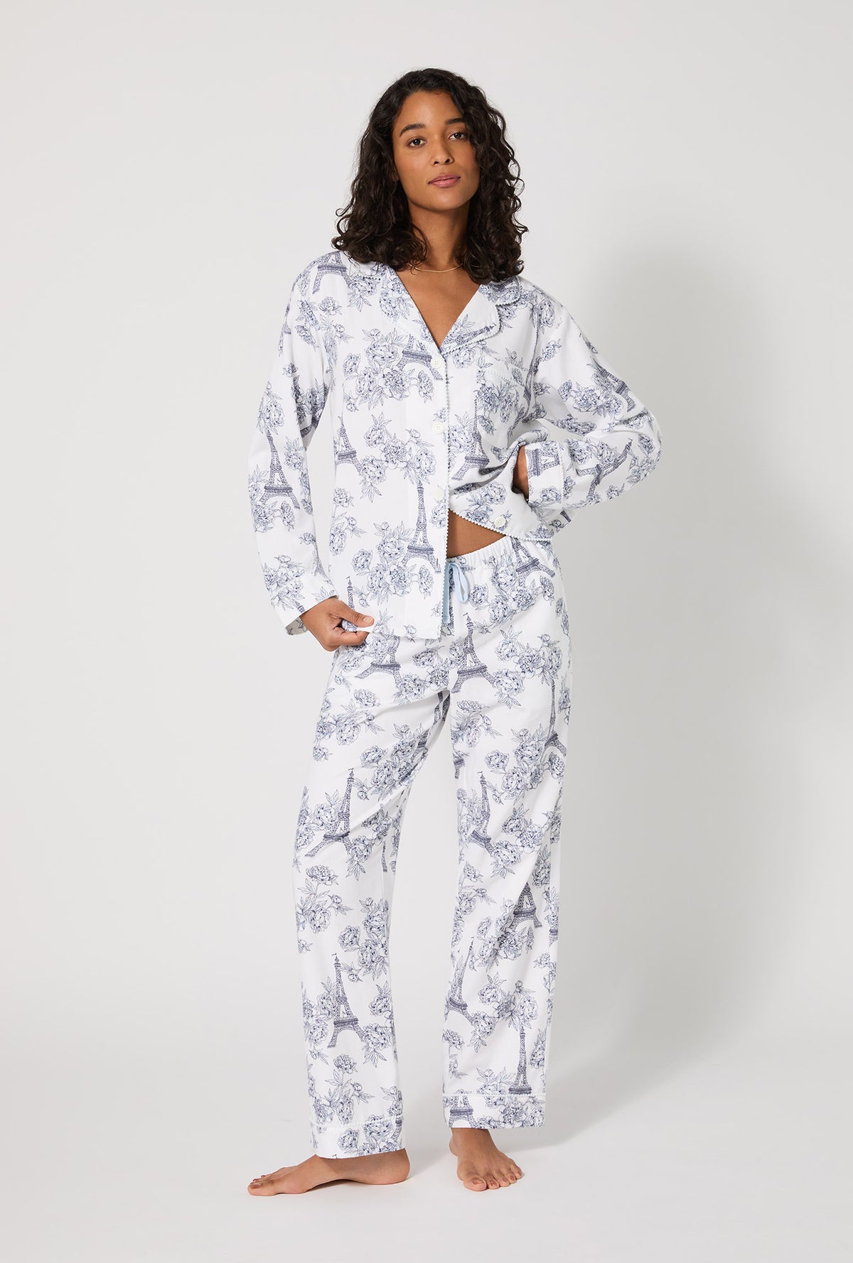 A lady wearing La Belle Eiffel Long Sleeve Classic Woven Portuguese Flannel PJ Set