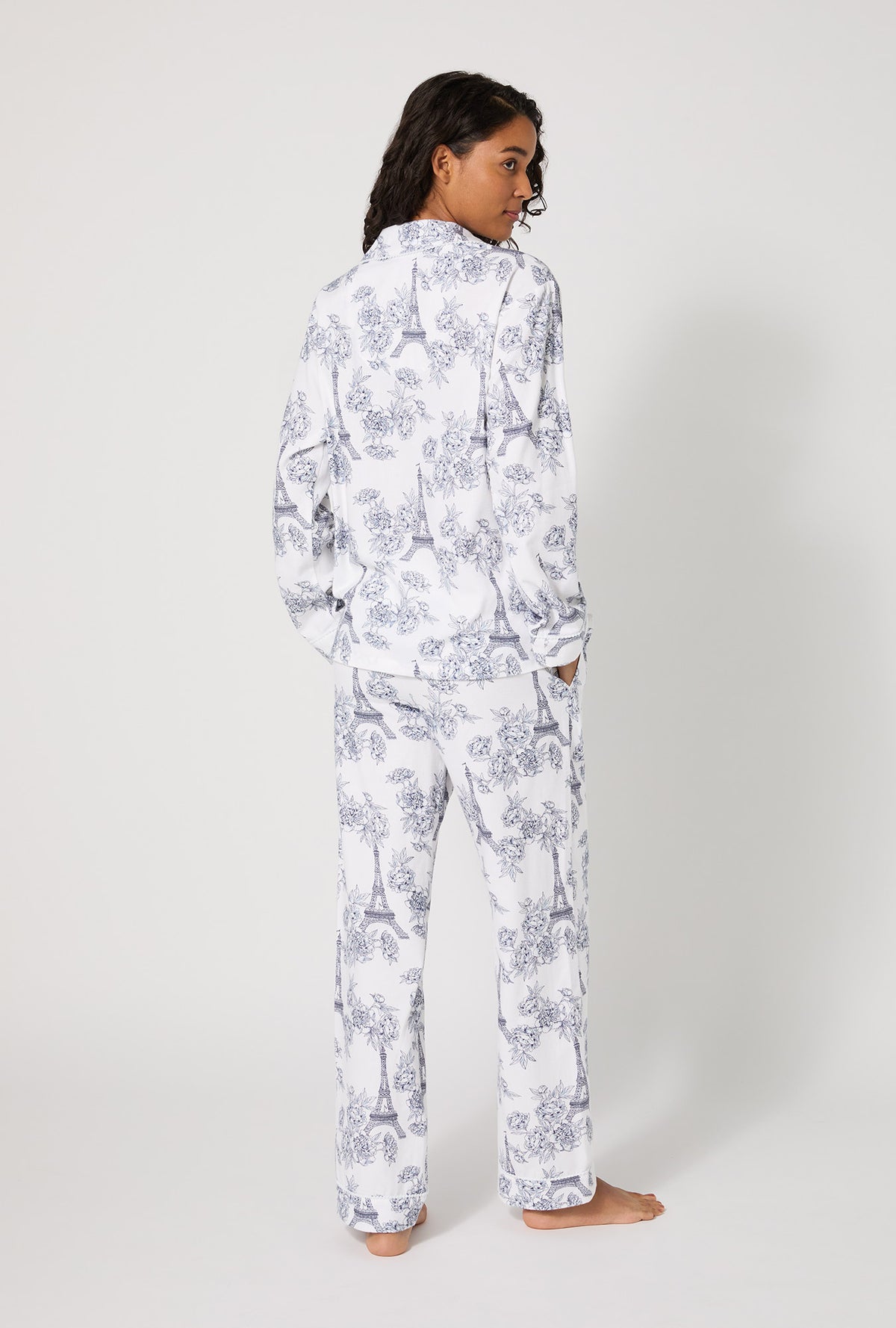 A lady wearing La Belle Eiffel Long Sleeve Classic Woven Portuguese Flannel PJ Set