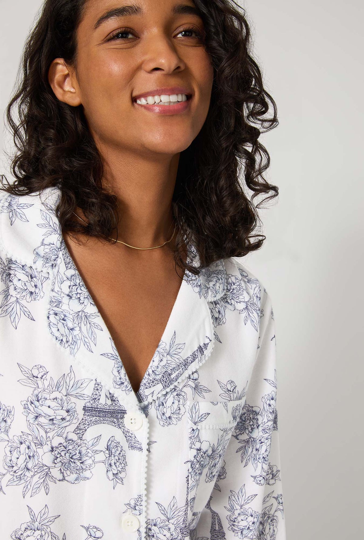 A lady wearing La Belle Eiffel Long Sleeve Classic Woven Portuguese Flannel PJ Set