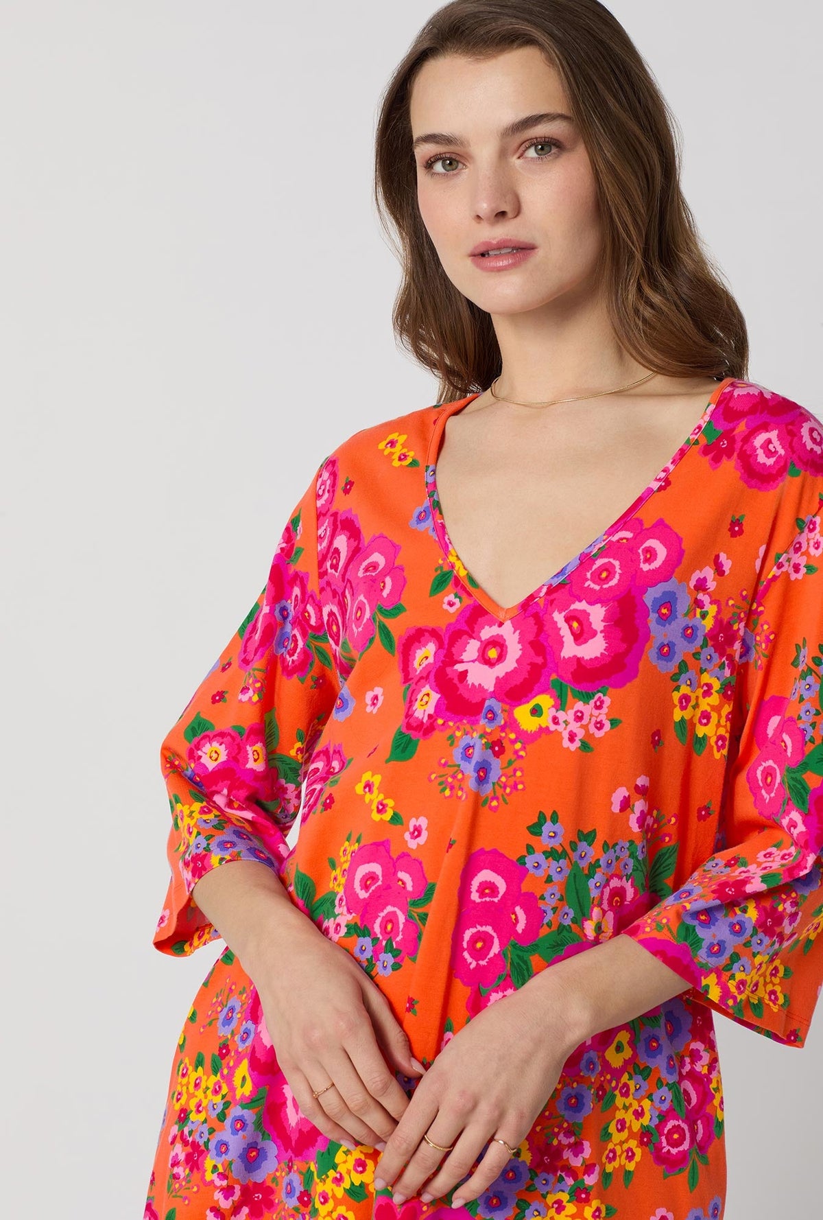 A closeup of A lady wearing Orange Stretch Jersey Sleep Dress