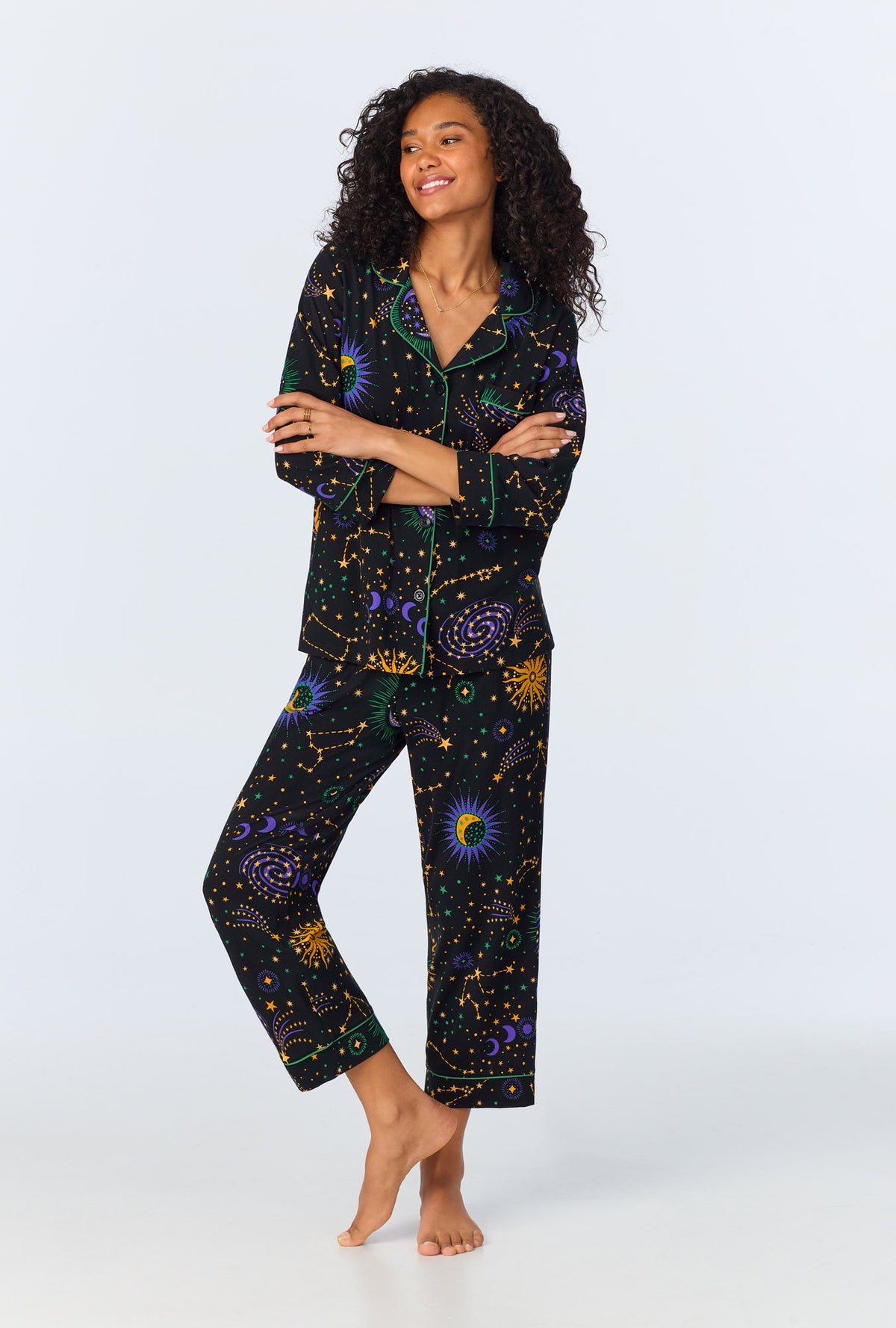 A lady wearing Night Sky 3/4 Sleeve Classic Stretch Jersey Cropped PJ Set