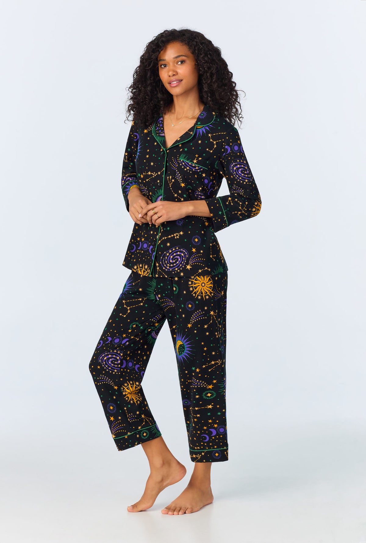 A lady wearing Night Sky 3/4 Sleeve Classic Stretch Jersey Cropped PJ Set