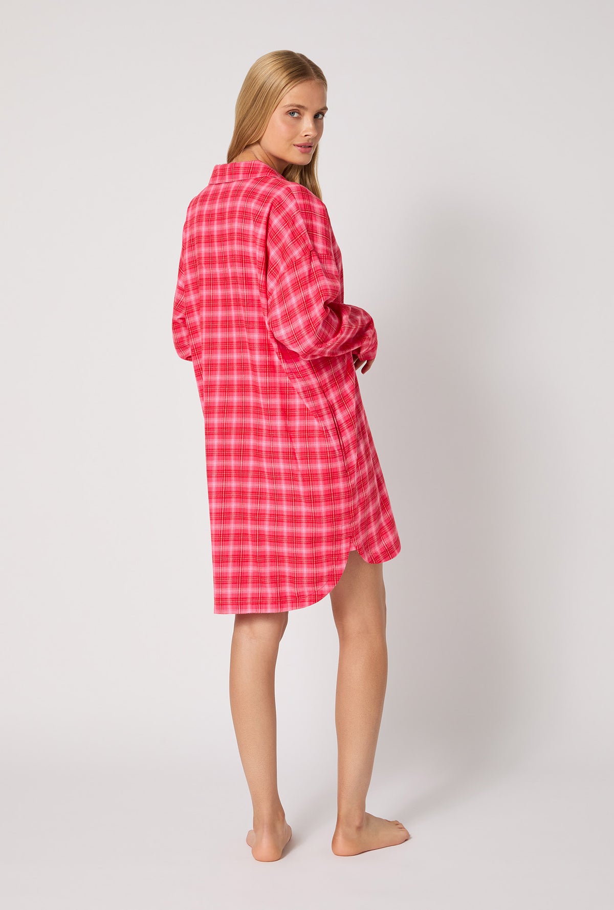 A lady wearing Wonderland Plaid High Low Woven Portuguese Flannel Boyfriend Shirt