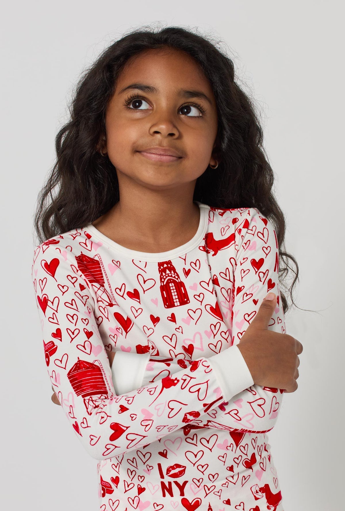 A girl wearing Heart Of The City Long Sleeve Stretch Jersey Kids Pj Set